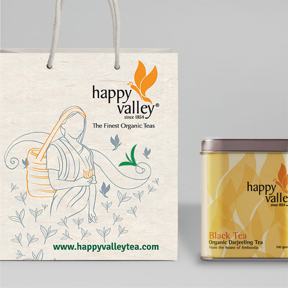 https://wysiwyg.co.in/sites/default/files/worksThumb/Ambootia-happy-valley-garden-packaging-paper-bag-2017.jpg