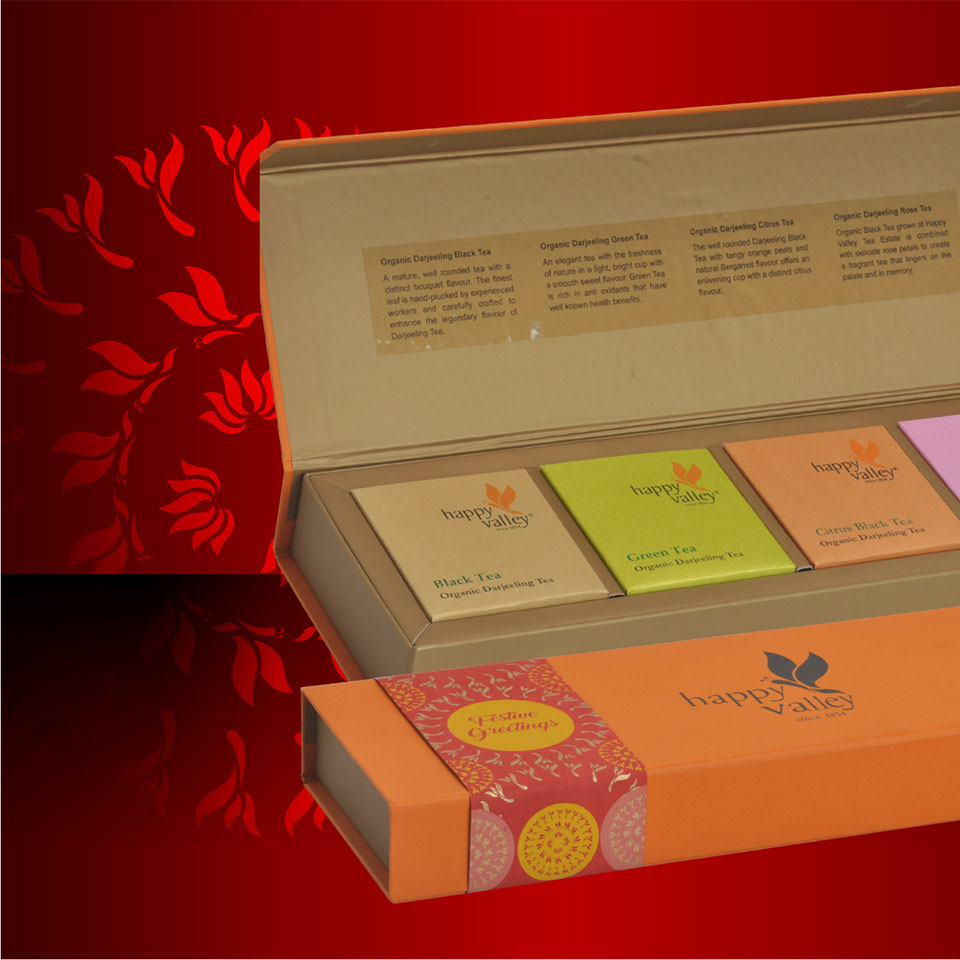 https://wysiwyg.co.in/sites/default/files/worksThumb/Ambootia-happy-valley-tea-packaging-box-festive-durga-puja-2017.jpg